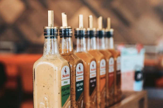 white and brown labeled bottle